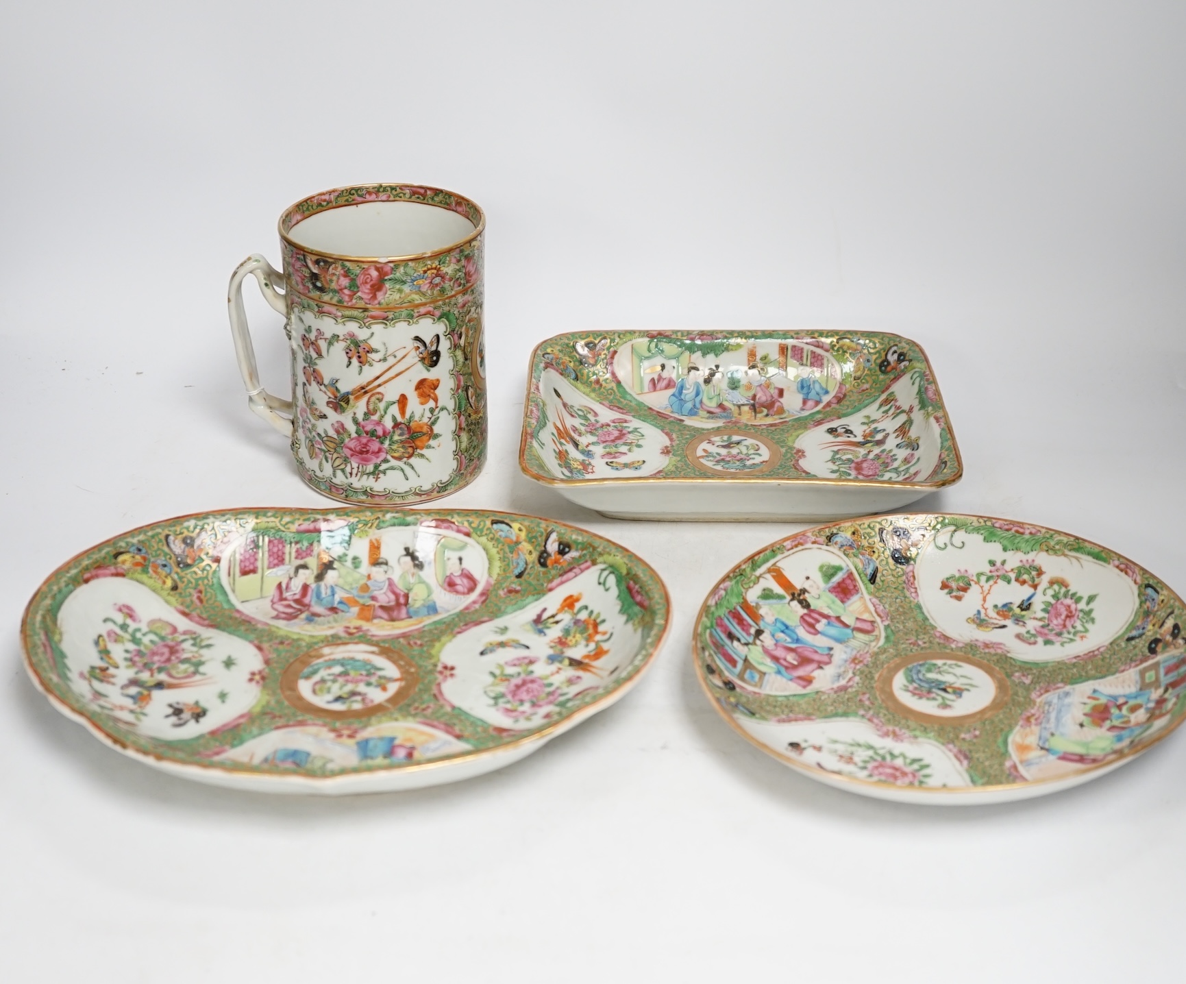 A group of Chinese famille rose dessert plates and dishes, and a mug, all Daoguang period (1821-50), mug